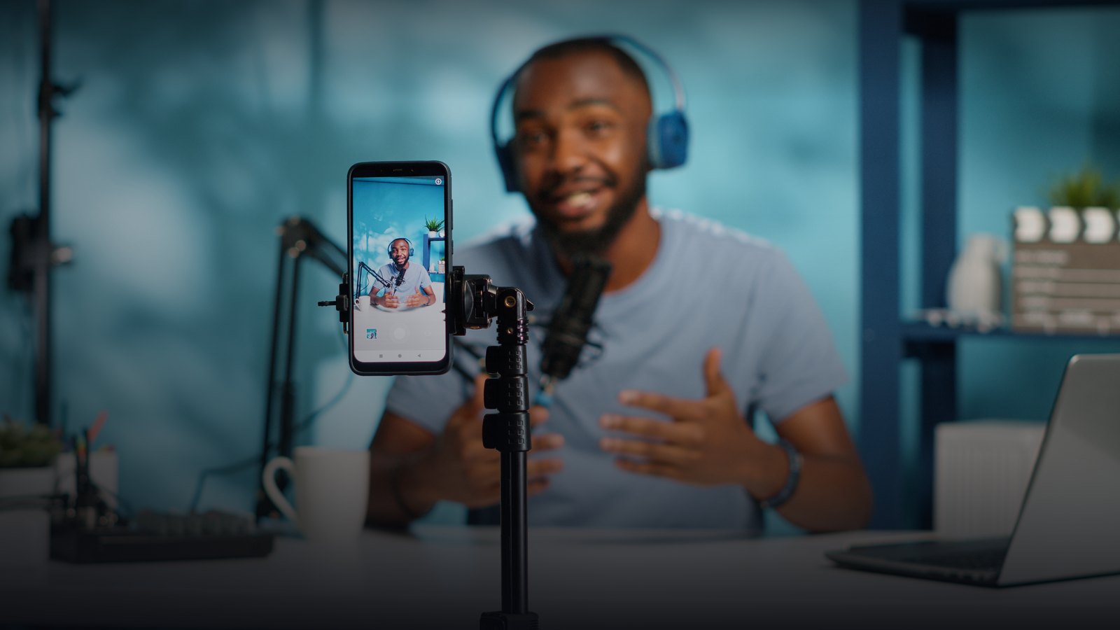 UGC creator filming branded video content in a home studio for West Palm Beach brands